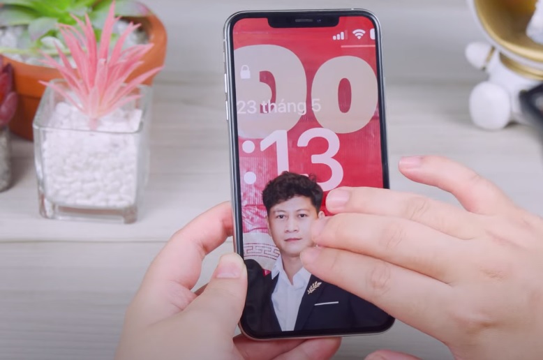 Nguyên nhân iPhone bị phóng to màn hình khóa sử dụng tip dùng 3 ngón tay